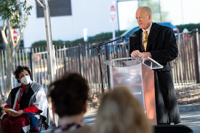 Jim O'Loughlin speaking to the audience