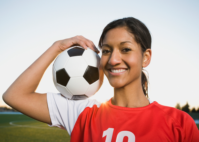 Girl playing soccer