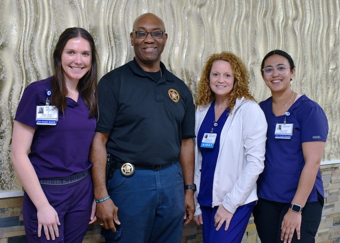 Aiken Regional patient Captain Eric Kirkland is shown here with members of his rehabilitation care team. From left: Maggie Davis, OT; Rhonda Ward, PTA; and Kesha Porter, PT.