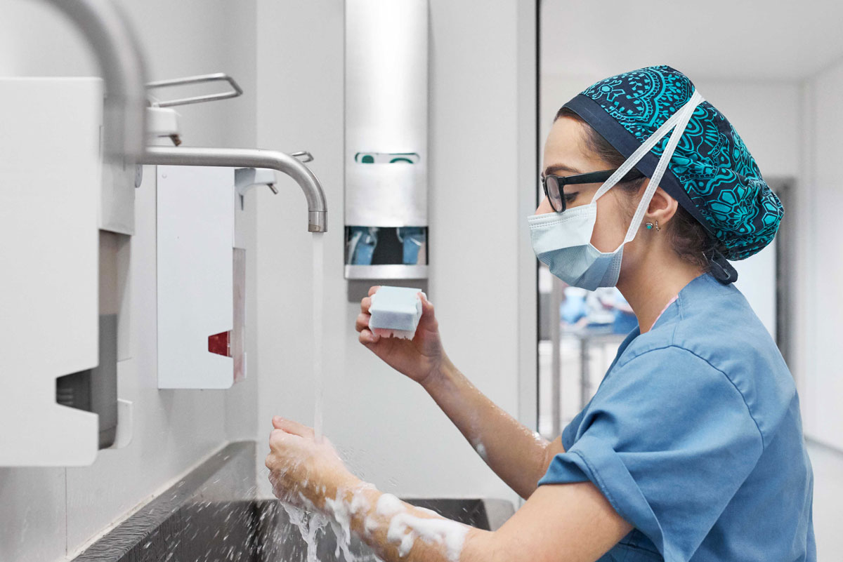 Bhagyashree Shastri scrubbing in to the operating room
