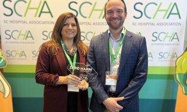 Lisa Reace, CPHRM, Administrative Director of Patient Safety and Risk Management, and Facility Compliance Officer, alongside Matt Merrifield, CEO