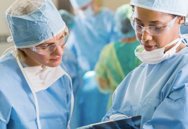 Two female surgeons in the operating room