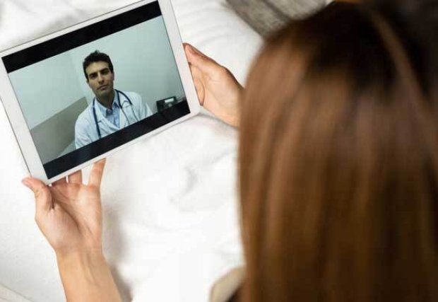 Woman on zoom with her doctor
