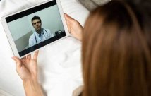 Woman on zoom with her doctor